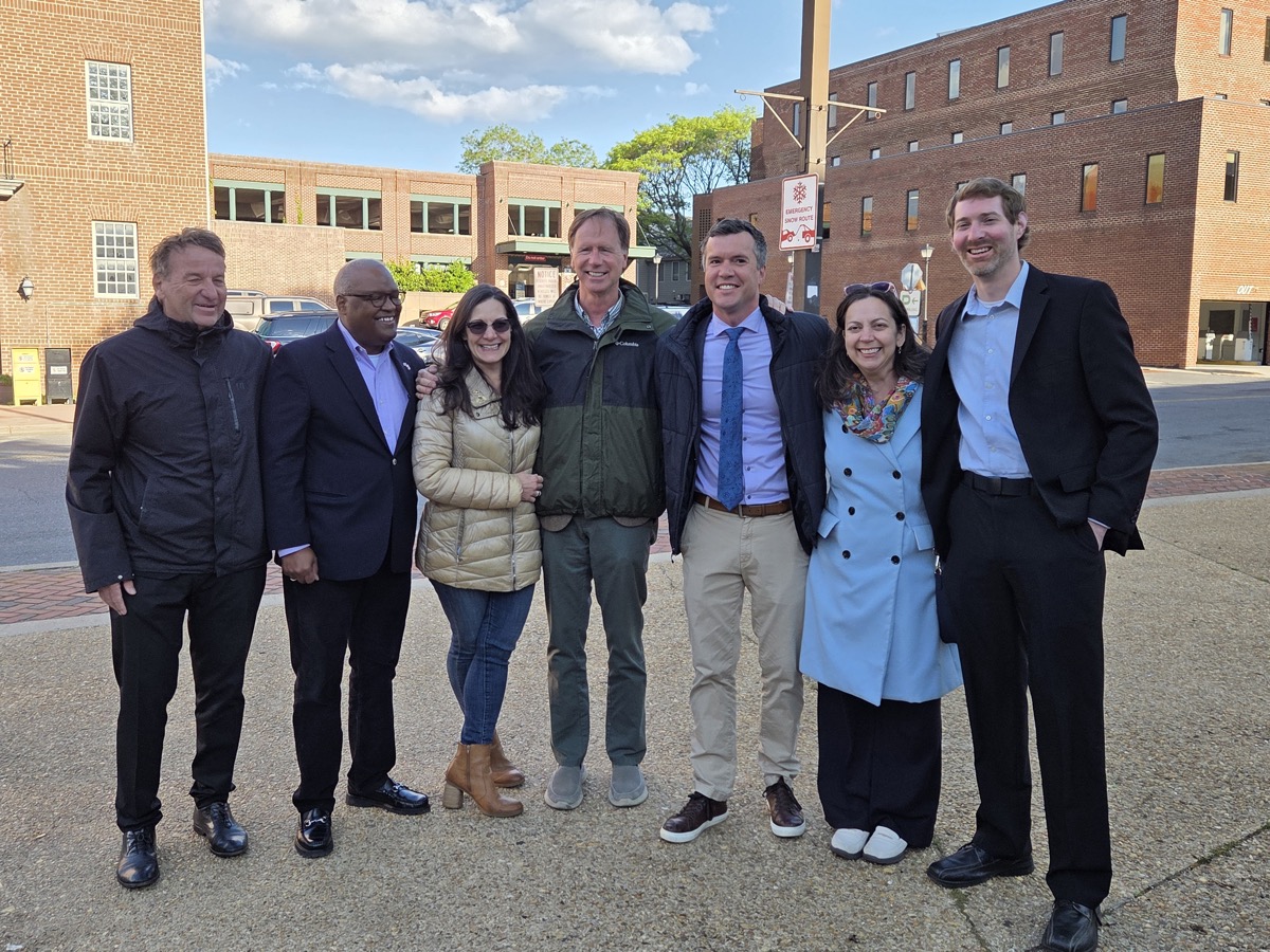 James meeting community members outdoors