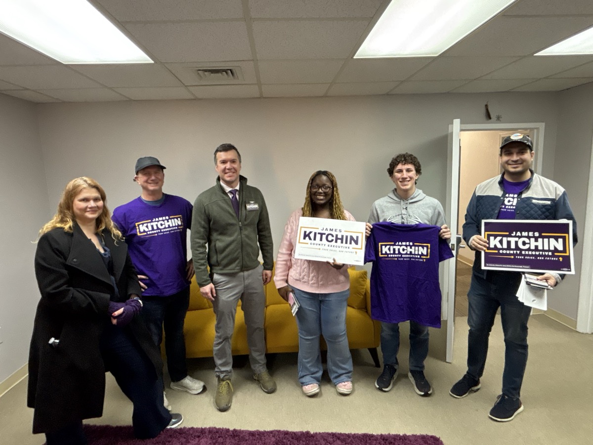 Campaign team with Kitchin signs and shirts at HQ