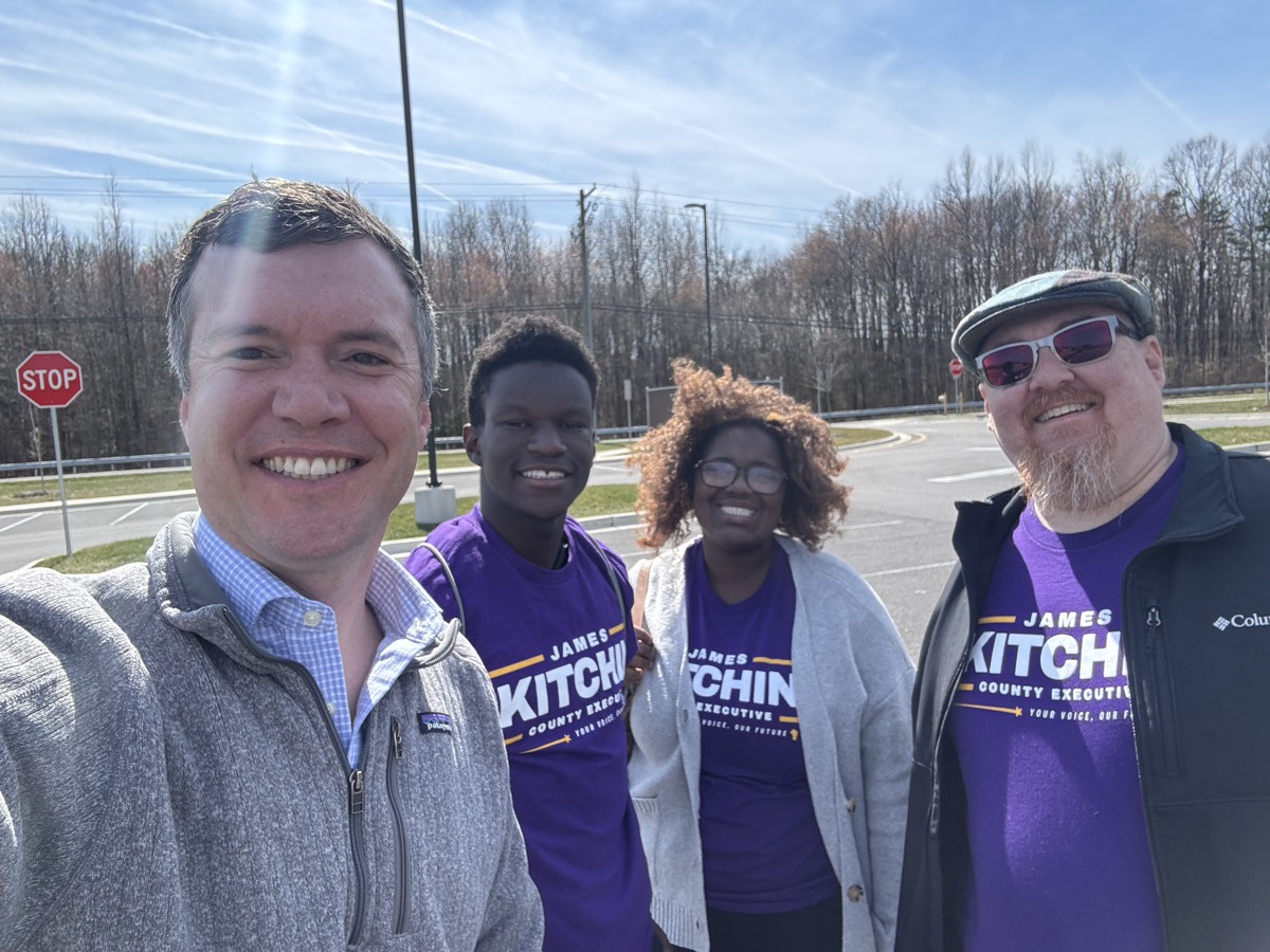 Canvassing team in Kitchin purple shirts