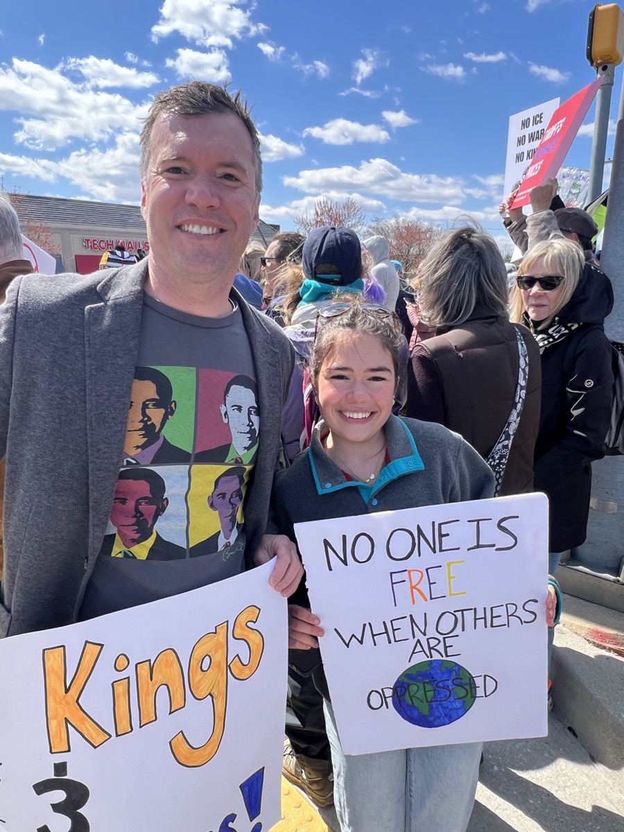James and his daughter at a community march